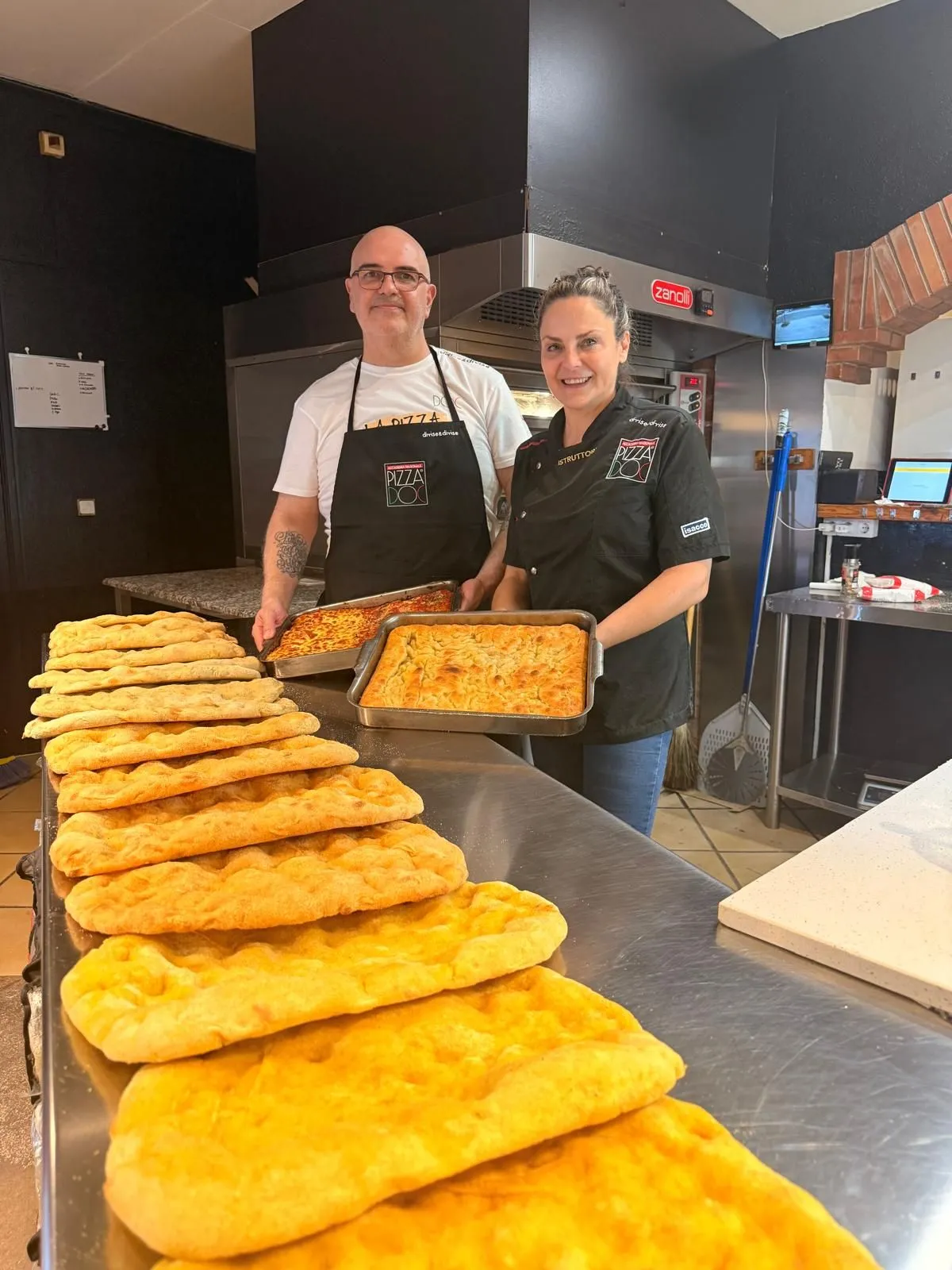 Luiggi en la masterclass de junio de 2026 en la Trattoria, con focaccias recién horneadas